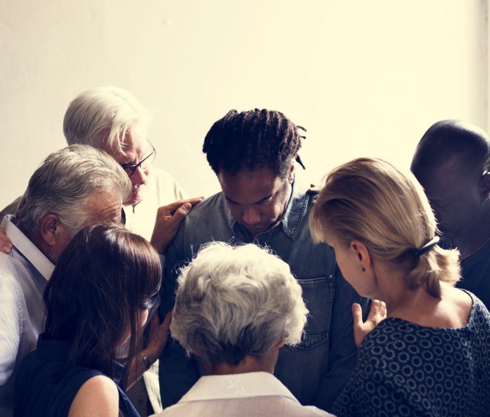 Group of diverse people gathering together support teamwork